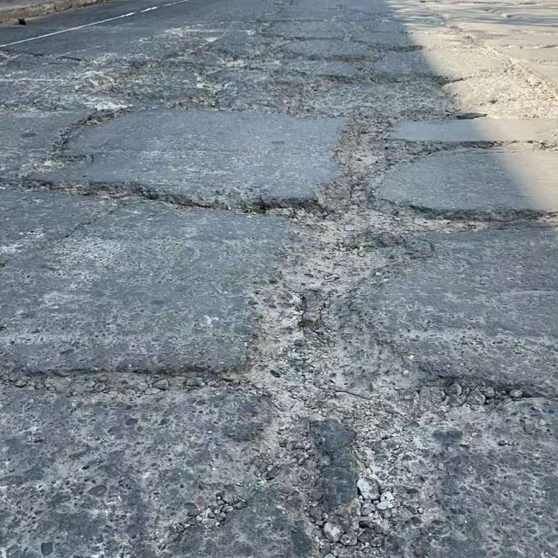 镇远路面起砂露石子修补料